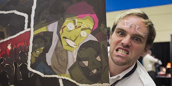 Rebuild backer Andy Moore with his zombie self on a banner at PAX Prime 2014
